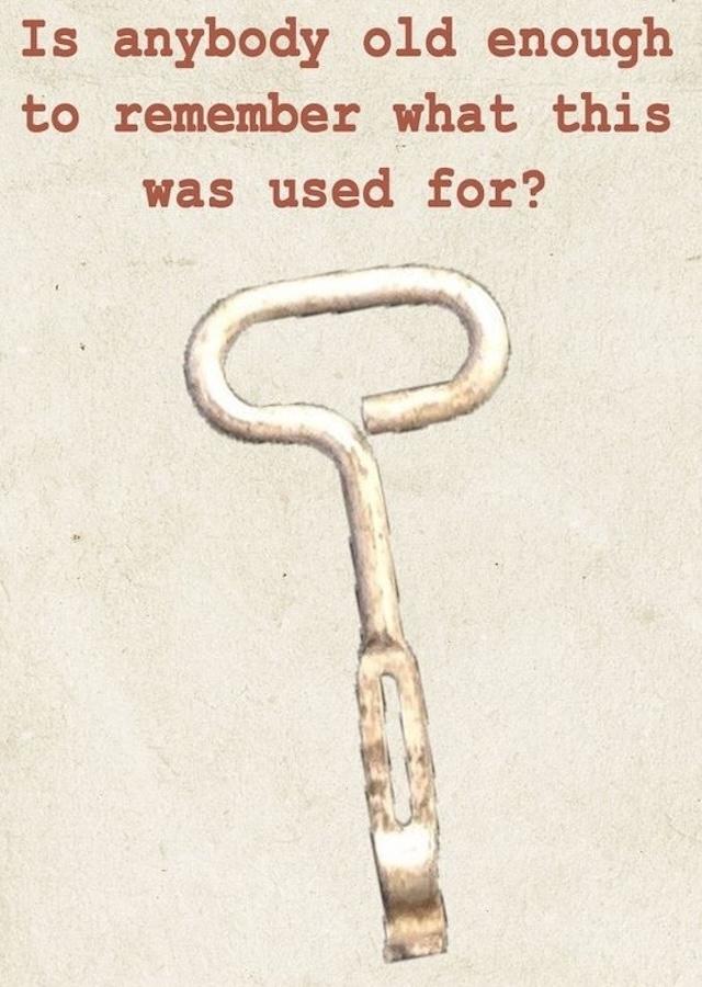 A classic, weathered paint can opener, bringing back memories of simpler times when a tool like this was an essential household item